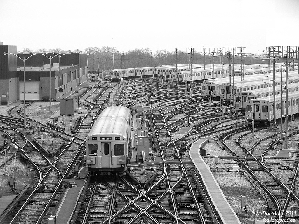 A pair of H6\'s makes it way up the ladder tracks of the TTC\'s sprawling Greenwood yard and shops complex in the afternoon. 6-car trains of H4, H6 and T1\'s are line up awaiting the call to rush hour service in a few hours time.