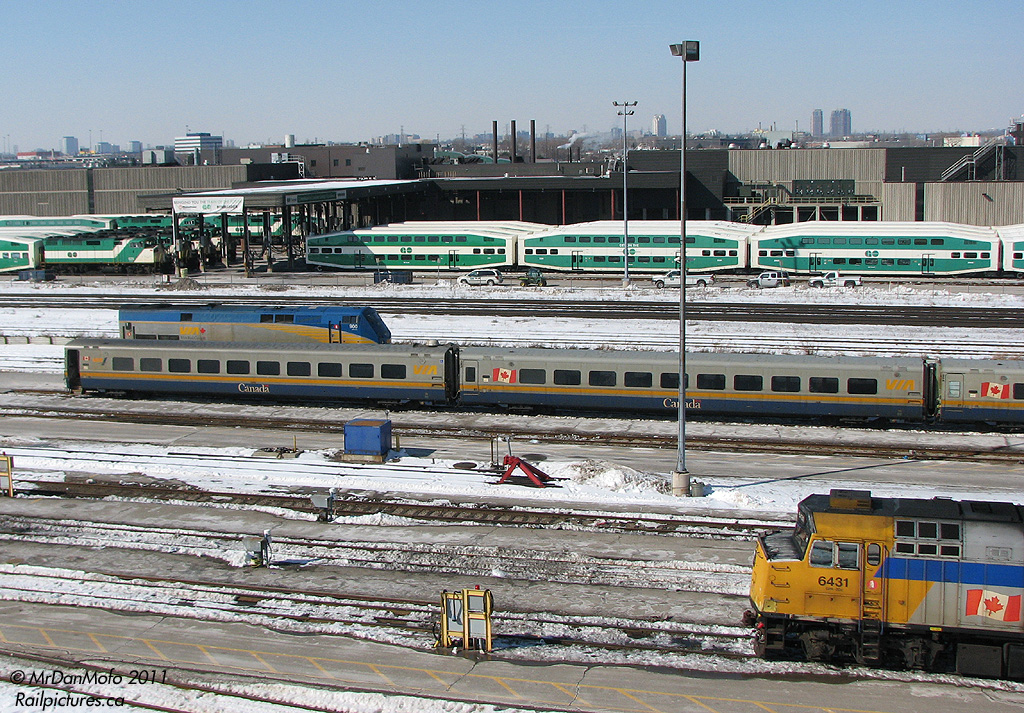 There\\s a little passenger something for everyone in this shot. VIA F40\\s and P42\\s mingle with LRC cars at VIA\\s Toronto Maintenance Centre, while GO Transit F59PH\\s and trains of bilevels sit in the background at Willowbrook yard & shops.