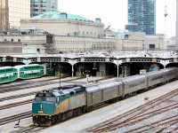 Rebuilt VIA F40PH-2 6449 leads a set of Budd-build HEP cars out from under the train shed on train #75. In the background is the grey "headhouse" of the 1920's-era Toronto Union Station, the tall rectangular part of which houses the famed Great Hall.