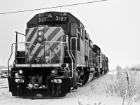 A frozen CP 3127 parked waiting for the crew to get out of a nice warm van and onto the frosty gm products.