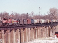 CP MLW C630-M 4508 leads a leased Algoma Central SD40 over the Ganaraska viaduct in Port Hope on a sunny Sunday afternoon in March 1985. Note the still existing former Port Hope, Lindsay and Beaverton tracks at the bottom of the picture.
