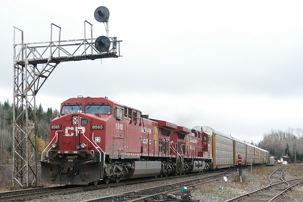 CP 8565 leads a DPU equipped 107 over the ACR diamond at Franz, Ontario on 19th October 2003. I was on the White River Budd cars and we went in the hole for this hotshot...I joined the crew on the ground to take this shot of the meet.