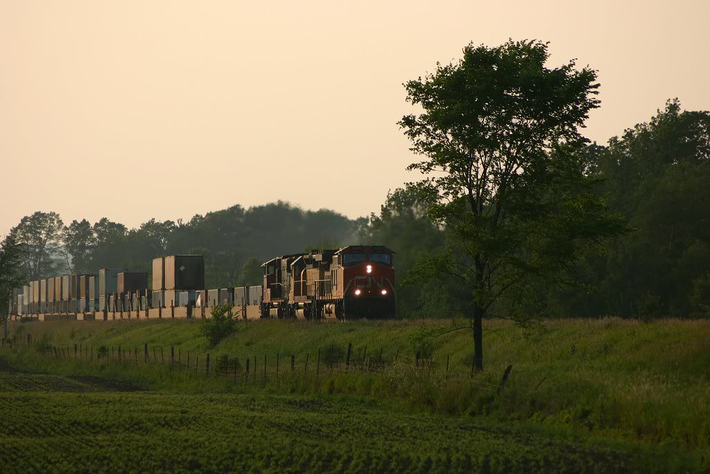 CN 149 coasts down hill towards Milton for a meet with 148 at sunset
