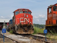 RMPX 9431, ex CN 9431 leads a mixed bag of power at the old CN shop at Hamilton. Railink 1359 on the next track looks like she has made her last trip and is waiting final disposal. She is also an ex CN unit.