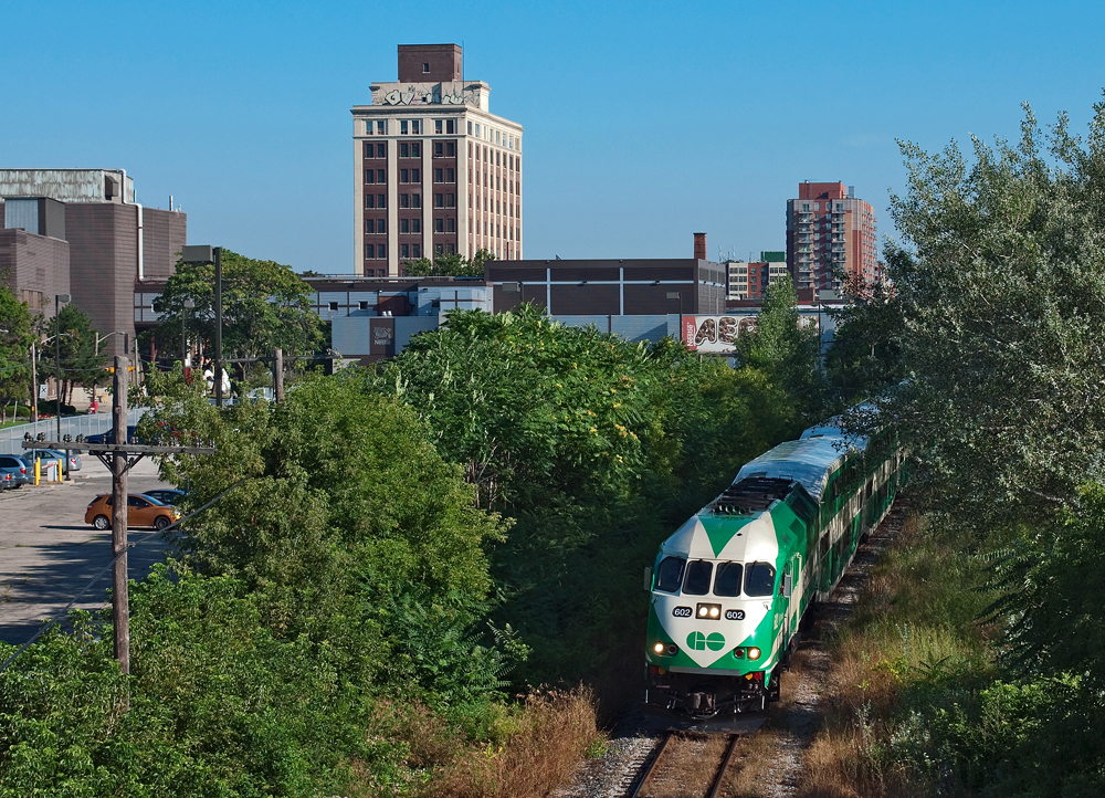 The last southbound morning GO train on the Newmarket Subdivision approaches Parkdale, the train is seen here passing Nestle plant which used to be Laura Secord and before that Rowntree (chocolates) originally Cowan.