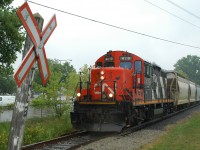 CN 580 passing one of the last remains of the TH&B on it\'s way to Johnsons Wax