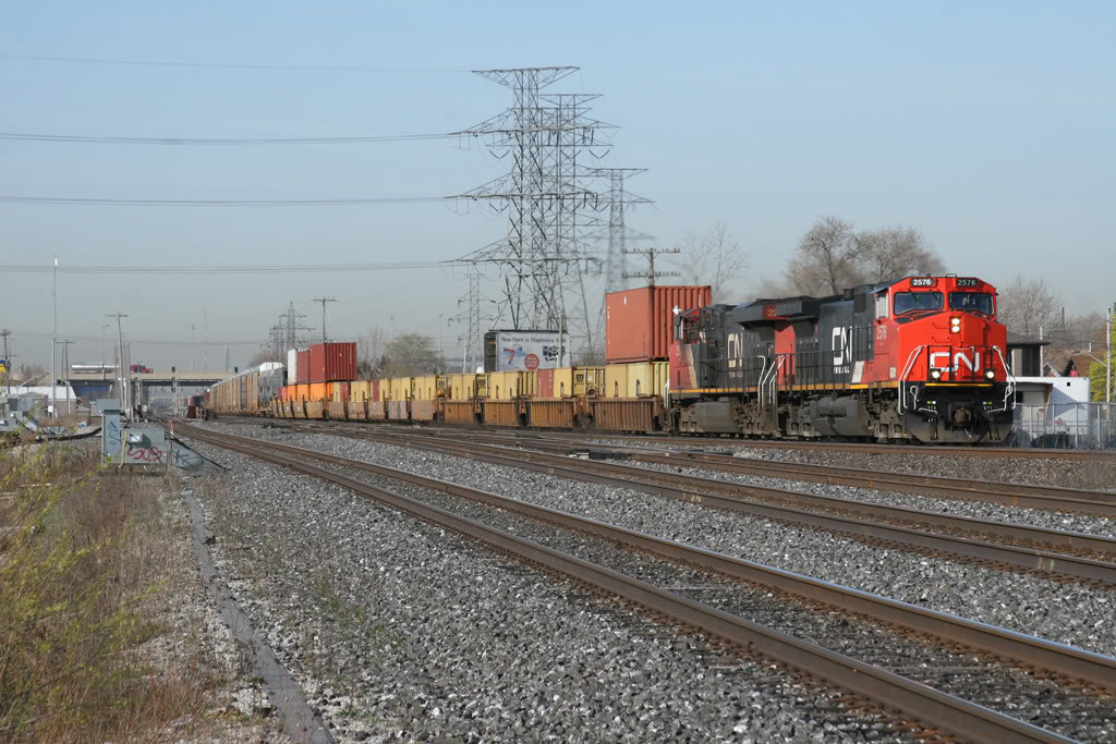 CN 382 enters the Halton sub at Burlington West, two PRR coaches can be seen just behind the intermodal cars