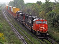 The rain should really help with the climb to Newtonville. CN 5734 and 8909 take 149 west. 1503hrs.