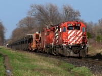 An empty CWR train highballs towards London.