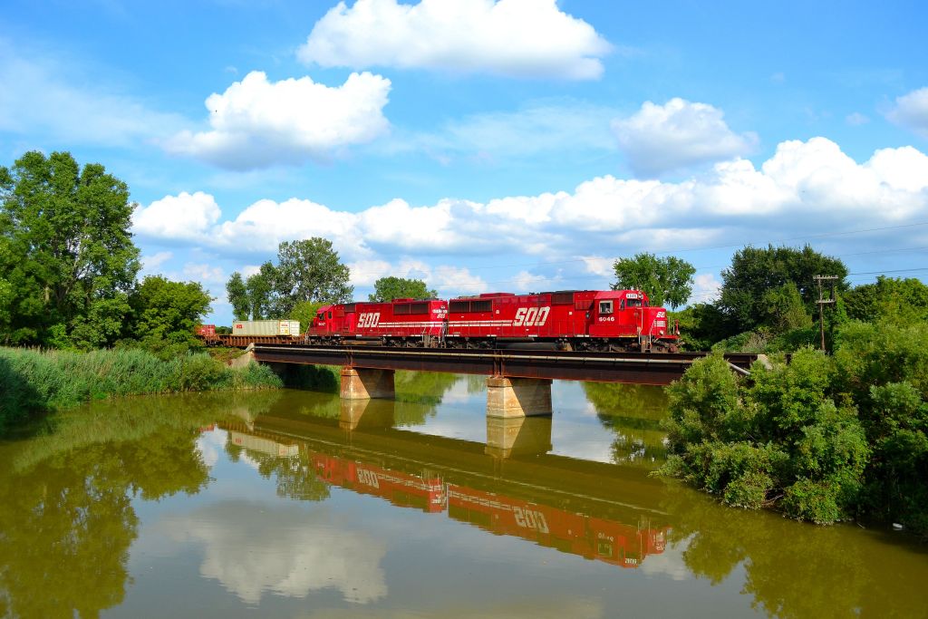 CP 241 led by SOO\'s 6046 & 6047, heads westbound over the canal bridge at mile 73.5 Windsor Sub.