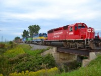 CP 242 east out of Tilbury with CP 5698, ICE 6212, NREX 7237 & CEFX 3127 as it passes over the bridge at Sinclair Road.