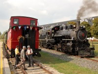 During the Oktoberfest weekend in Kitchener-Waterloo, the Waterloo Central Railway (operated by the Southern Ontario Locomotive Restoration Society) brought out No. 9 for the round trips to St Jacob's and return. But after a round of morning trips the ailing locomitve wasn't doing to well. Here volunteers pause to discuss the situation before departing for St Jacob's. 