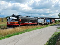 CP 242 pulls up to make a hot one car lift at Galt allowing for a clear shot of AZER 6070 an E8. CP 242\'s lash up included 4 differnt locomotives in four differnt paint schemes CP 8639(GE)+ CEFX 3149(SD 45)+ CITX 3081(sd 40-2) + AZER 6070(E8)