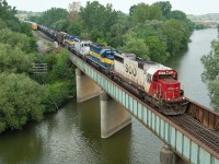 CP 643\'s colourful lashup pulls ethonal empties west to be reloaded. 