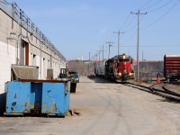 After working the Galt Industrial for most of the afternoon, the crew of GEXR 580 prepares to lift the solo CP highcube box at Gillies Lumber before returning to Kitchener via the Fergus Sub (to Guelph).