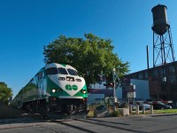 The large Canadian General Electric water tower, a symbol to the glory day of industries that littered the junction triangle in the west end of the city, GO Train 804 is on the last leg of it's journey to Toronto and is seen here crossing Wallace Ave. 