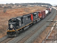 1st X371 rolls through Lovekin behind IC1007 and CN 8908. The crew described the 1007 as a \'piece of junk\' to a passing crew that ribbed them on having the pride of the fleet leading. BTW, 2nd X371 passed by an hour later. 1233