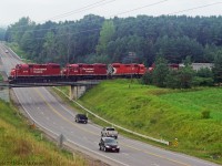 The Havelock Sub has very few bridges over traffic 5 to be exact,Simcoe street offers the nicest views seen is T08 3114,3045,3133 and the GP9 switcher for Peterborough 8206 in tow 