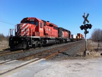 CP 231 pauses for a few moments to meet an eastbound in Lovekin. As soon as the eastbound clears, he\'ll proceed west to Toronto, Obico.