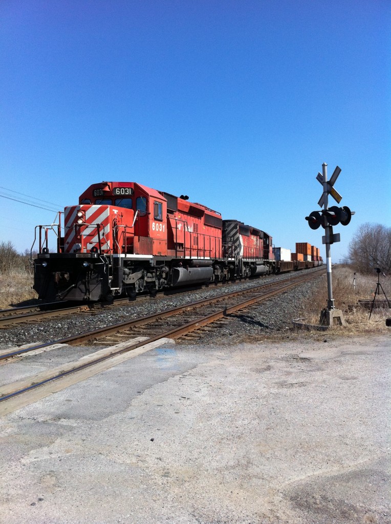CP 231 pauses for a few moments to meet an eastbound in Lovekin. As soon as the eastbound clears, he\'ll proceed west to Toronto, Obico.