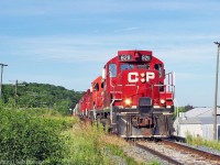 Leaving the hills of Purple Woods Conservation Area behind T07 crosses Simcoe st and Raglan Industries.