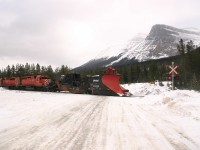 CP 5766 leads a plow extra over the Lake O\'Hara grade crossing heading to Partridge, Yoho and Cathedral to plow the snow off the mainline which fell after Parks Canada caused controlled avalanches in the eastern end of the Kicking Horse River Valley