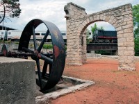 The final curtain call, framed by the stone arch of the old grain mill OSRX 506 shoves back into Guelph after the final run of the Guelph Junction Express rare mileage tour. This train will mark the end of passenger excursions and tours on the Guelph Junction Railway. 