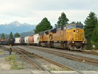 Union Pacific SD9043MACs 8305 and 8285 lead a westbound graintrain through Cranbrook.