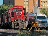 It's a perfect sunny morning in Hamilton as the CP mechanical guys prep, fuel and service Kinnear's 3 GP9u's for today's duty. The train will run light power down the hole into the industrial part of Hamilton on the east side of town to do National Steel Car, Stelco and US Steel. 