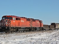 A pair of SD40-2F\'s lead 451 west of Virden on boxing day of 09.