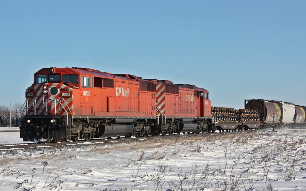 A pair of SD40-2F\'s lead 451 west of Virden on boxing day of 09.