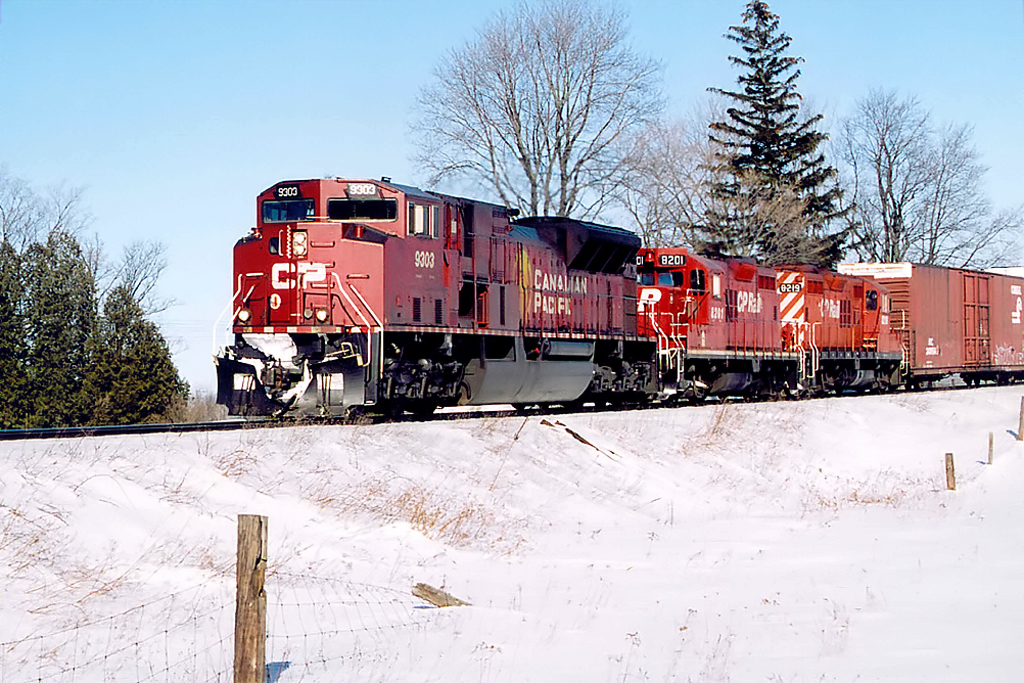 SD90MAC 9303 leads two GP9\'s into Galt