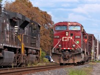 A light power move from the states moves through the siding track and around CN F328 that is stopped on the main awaiting a puller crew from the states to take her to Taft St. CP 2/247 will run light to Welland and lift excess traffic due to hurriance Irene back to Toronto. 
