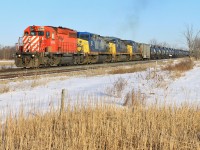 An SD40-2 provides the necessary cover for a trio of CSX GEs on another 626 ethanol movement.