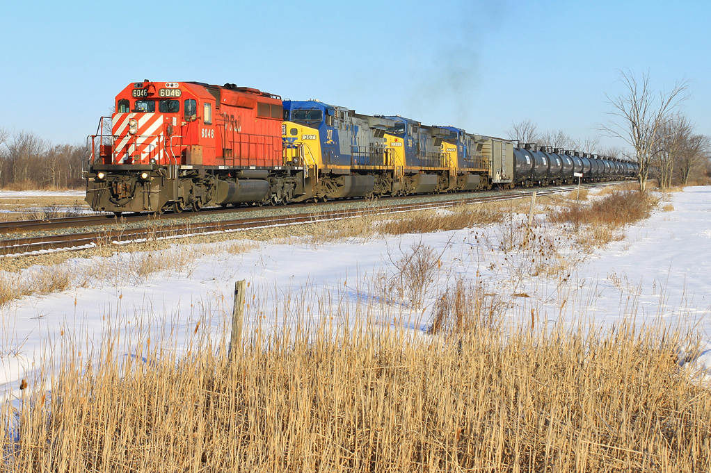An SD40-2 provides the necessary cover for a trio of CSX GEs on another 626 ethanol movement.