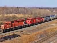 Only on Canadian Pacific would you see a lashup like this: CP 5927, SOO 6062, HLCX 6341 (Ex Southern Pacific) and D&H 7304 still in its original paint.