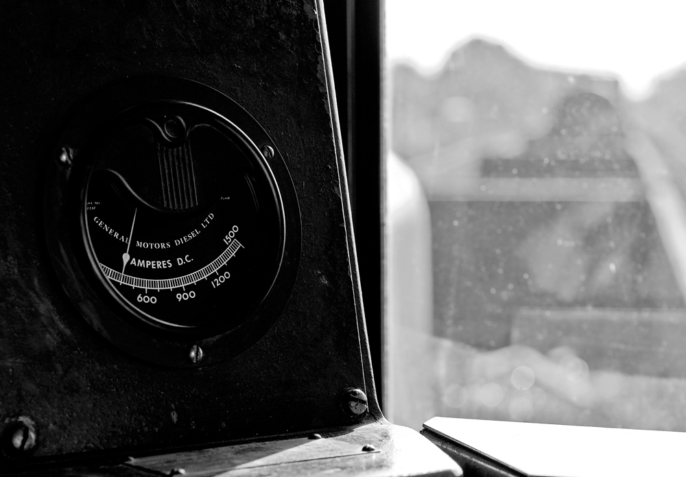 With the engineer, engineer trainee and conductor in the lead unit, I resorted to riding in the trailing unit as we doing about 45 MPH with 12 cars along the South Track of the Halton Subdivision between Tansley and Ash, the ammeter is showing a total of 400 amps, this is easy tonnage for this pair of GP38-2\'s.