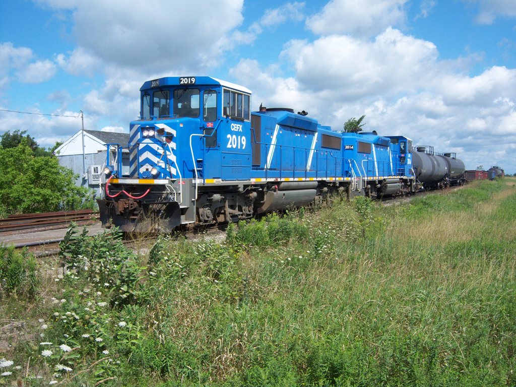 CEFX 2019 and 2014 work the SOR (Southern Ontario Railway) Yard at Garnet Ontario.  They are building a train of tank cars for ESSO at Nanticoke Ontario.  The SOR operates from Nanticoke to Brantford on the CN Hagersville Sub.  They also have trackage rights on the Dundas Sub from Paris to Hamilton.