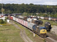 Almost a month from Hurricane Irene and the flash flooding and washouts that happened along the eastern coast, CN F32822-13 Norfolk Southern detour train rolls right along thru SOR Yard as it heads back to Fort Erie to be handed back to NS. CSX 371, CSX 4715 lead F328.