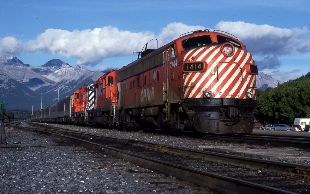 The true Canadian led by FP 9 #1414 pauses under late summer skies... Even though 33 years have passed since I hit the shutter button, it seem like yesterday.  Here\'s to CP for running a class operation