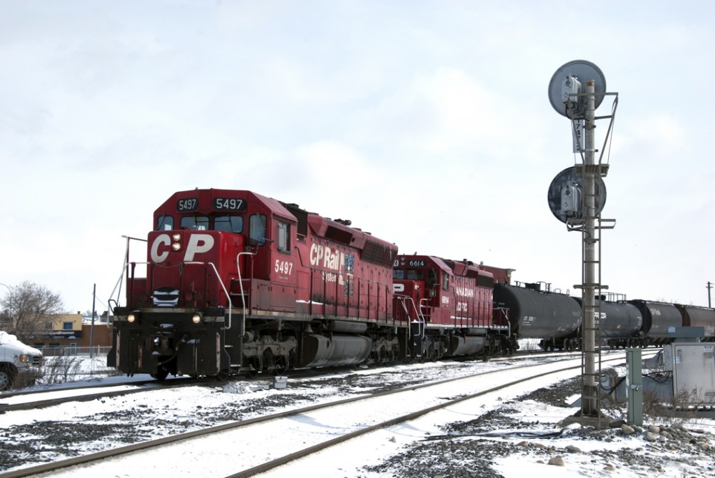 One can only imagine if CP had purchased true SD45\'s. Here CP 5497, looking like a\" true 45\", works the yard at Calgary on a snowy April afternoon.