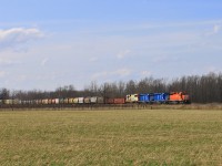 CP 6036 rolls through the countryside of Grassie, Ontario.