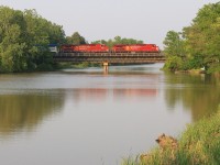 CP 9531 leads 254-07 over the Grand River with SLRG 8524 in trail.