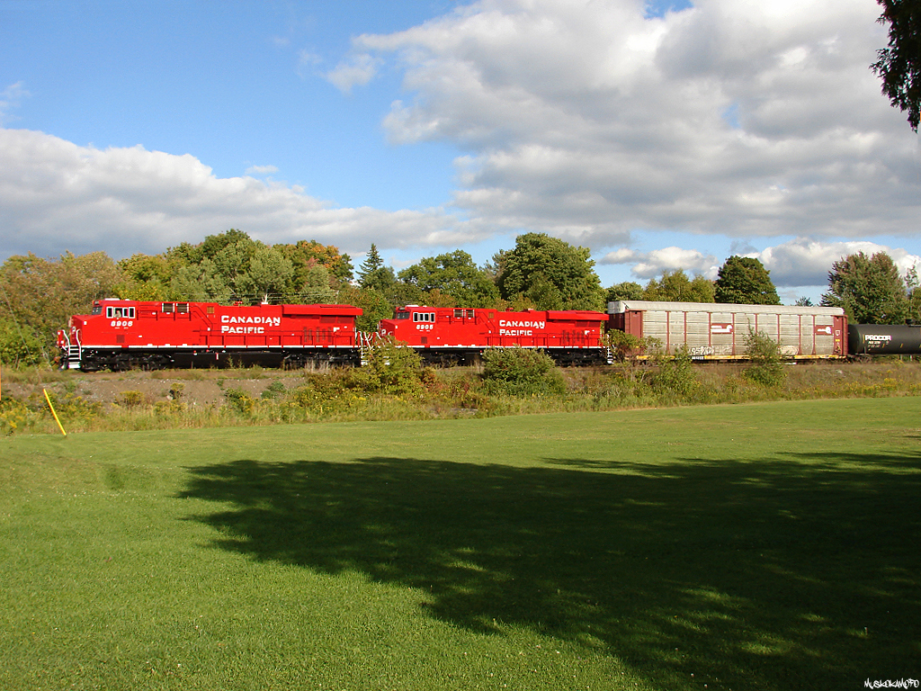 Brand new CP 8906 North leaving MacTier with 119\'s freight of 6 mixed and 93 platforms for 99 cars total. These new ES44AC\'s look pretty sharp, I like the bulkier look.