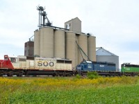 CP 245 led by SOO 6030, HLCX 8163 & HLCX 7230 heads westbound past the grain elevator at Haycroft. mp 86 Windsor Sub