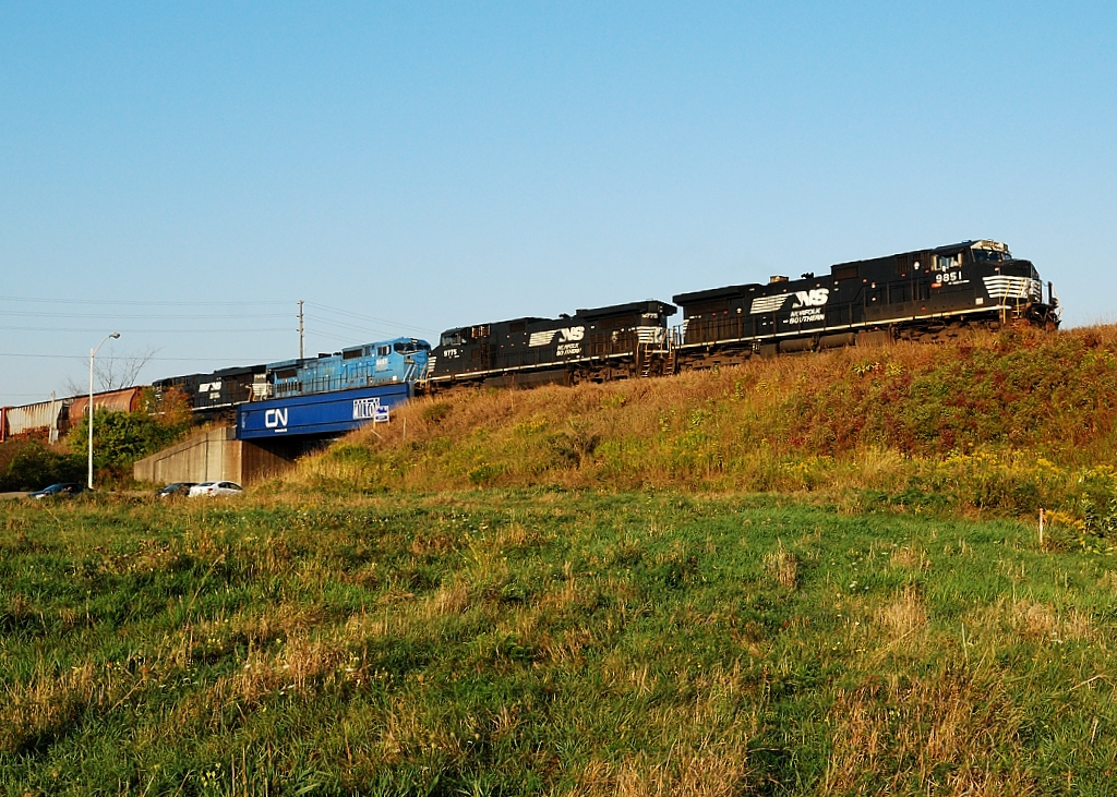 CN F329 a NS Fort Erie to Monteral detour makes it way though Milton without a CN leader.