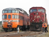 CP 9147 holds for the Empress as the Hiawatha observation car rolls on by.
