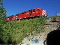 3133 is seen crossing a crumbling early century bridge at Westney Rd.1 of 3 on the Havelock Sub dated 1911 the other 2 are located in Green River and in the backwoods near Balsam over the former 6th concession.