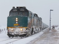 A late running #14 pauses to drop off a couple of passengers before heading east to Halifax.