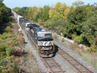 CN 328, not related to the Fort Erie-St. Thomas train, but certainly reminiscent to it; NS 7709 is seen charging a westbound detour train through Glenridge on a warm fall morning after meeting 331 at Jordan. 